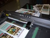 Rollem scoring machine infeed