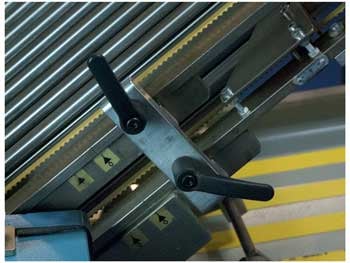 Levers of folding machine in different positions